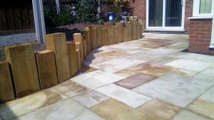 curved patio with wood border