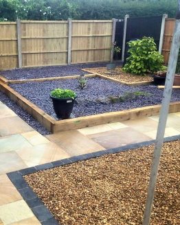 custom garden with paving and stones